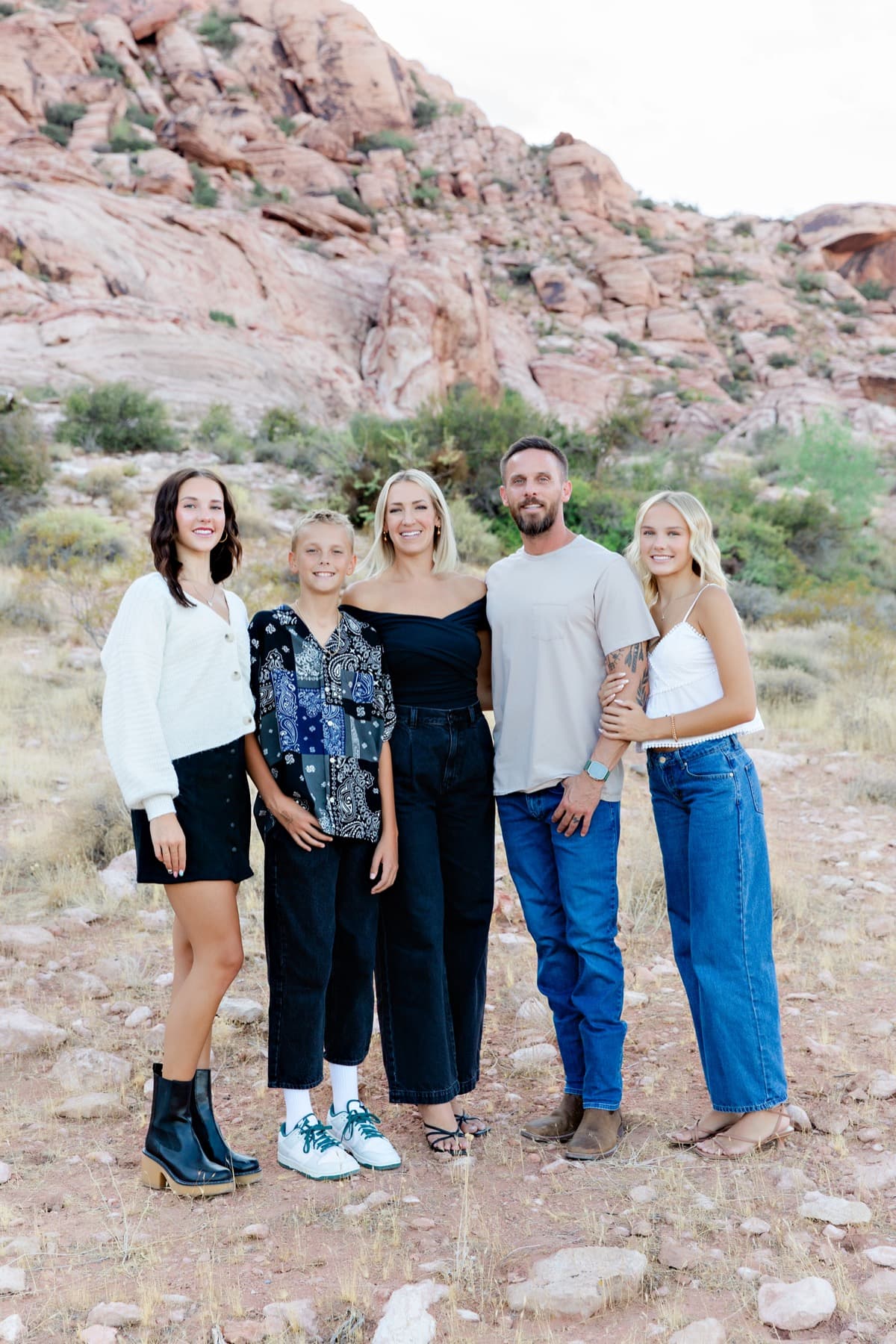 Family with young kids at golden hour in a Las Vegas field