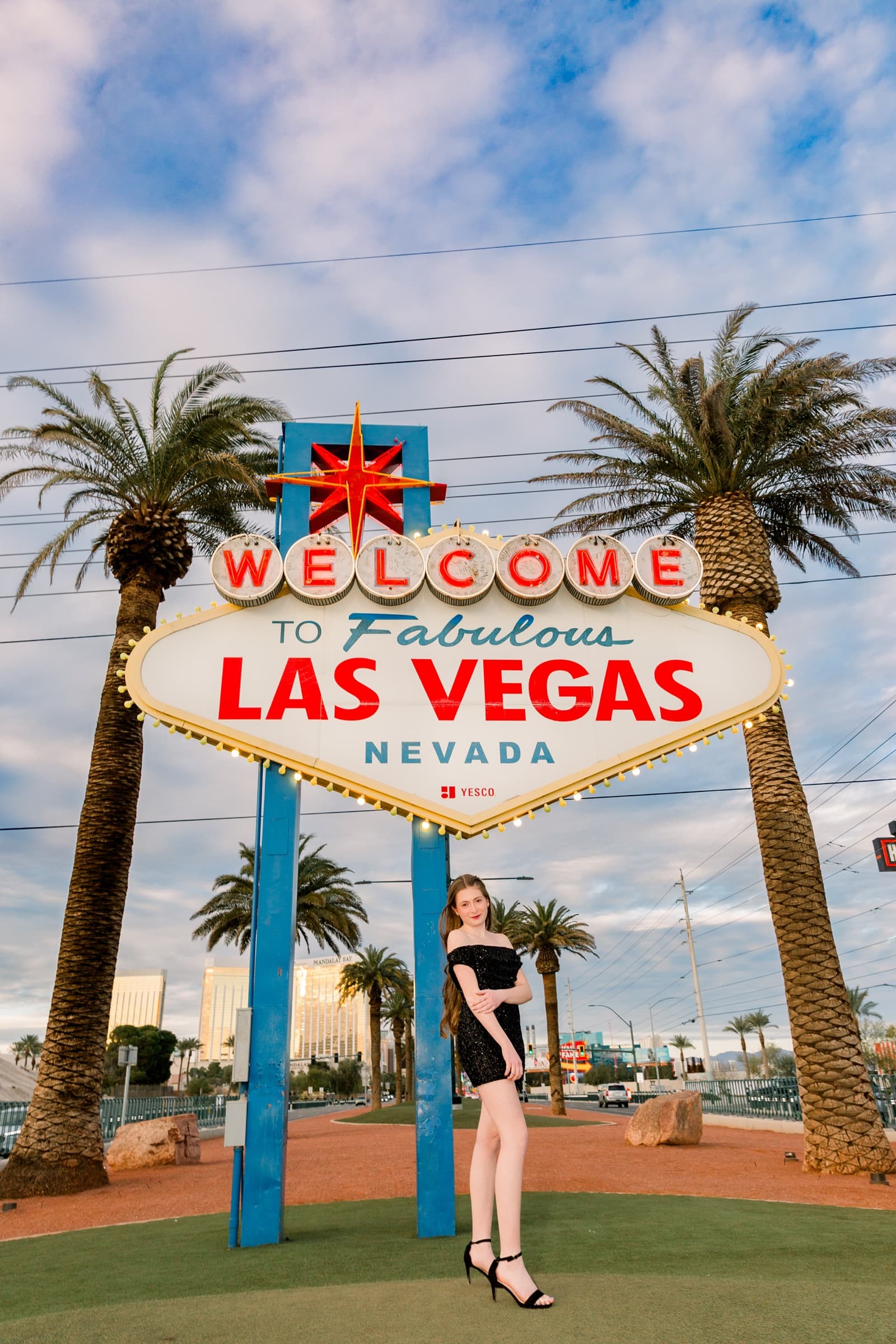 Senior girl black dress at Welcome to Las Vegas sign