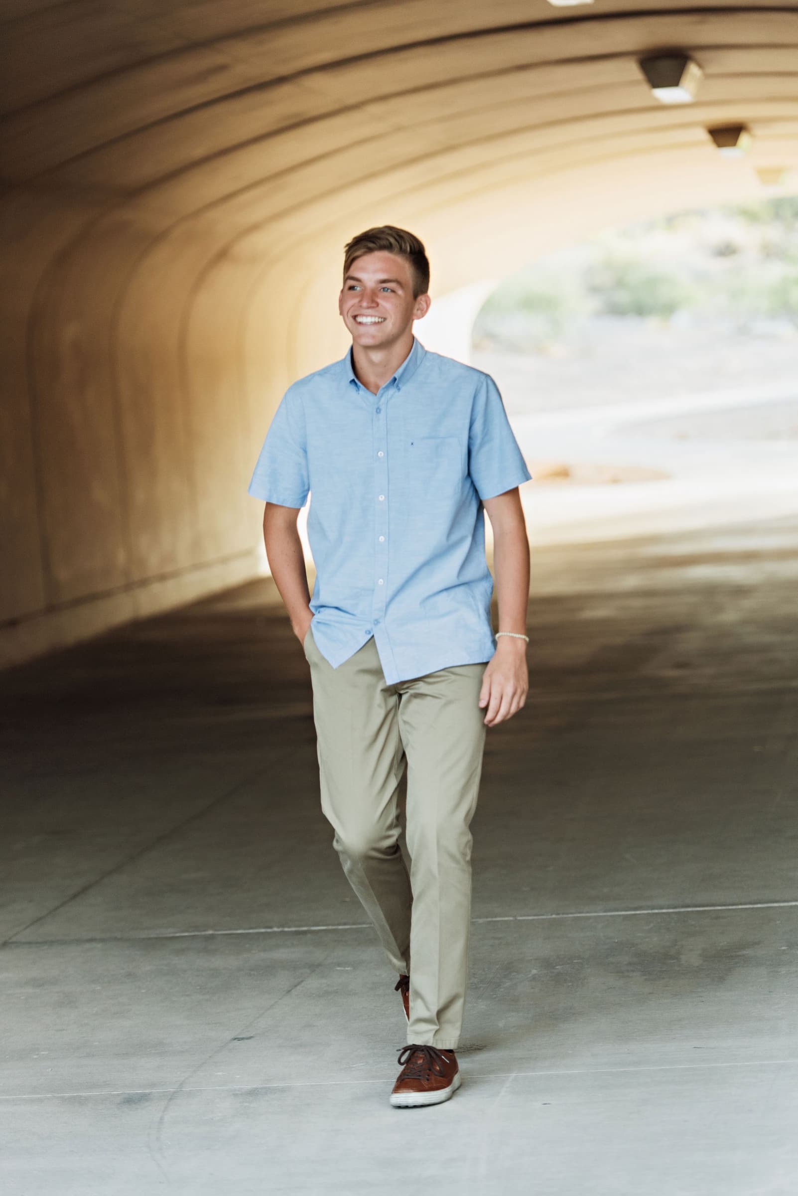 Senior boy chambray button-down at tunnel